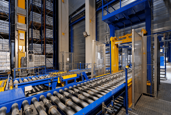 Stacked pallets and conveyor system