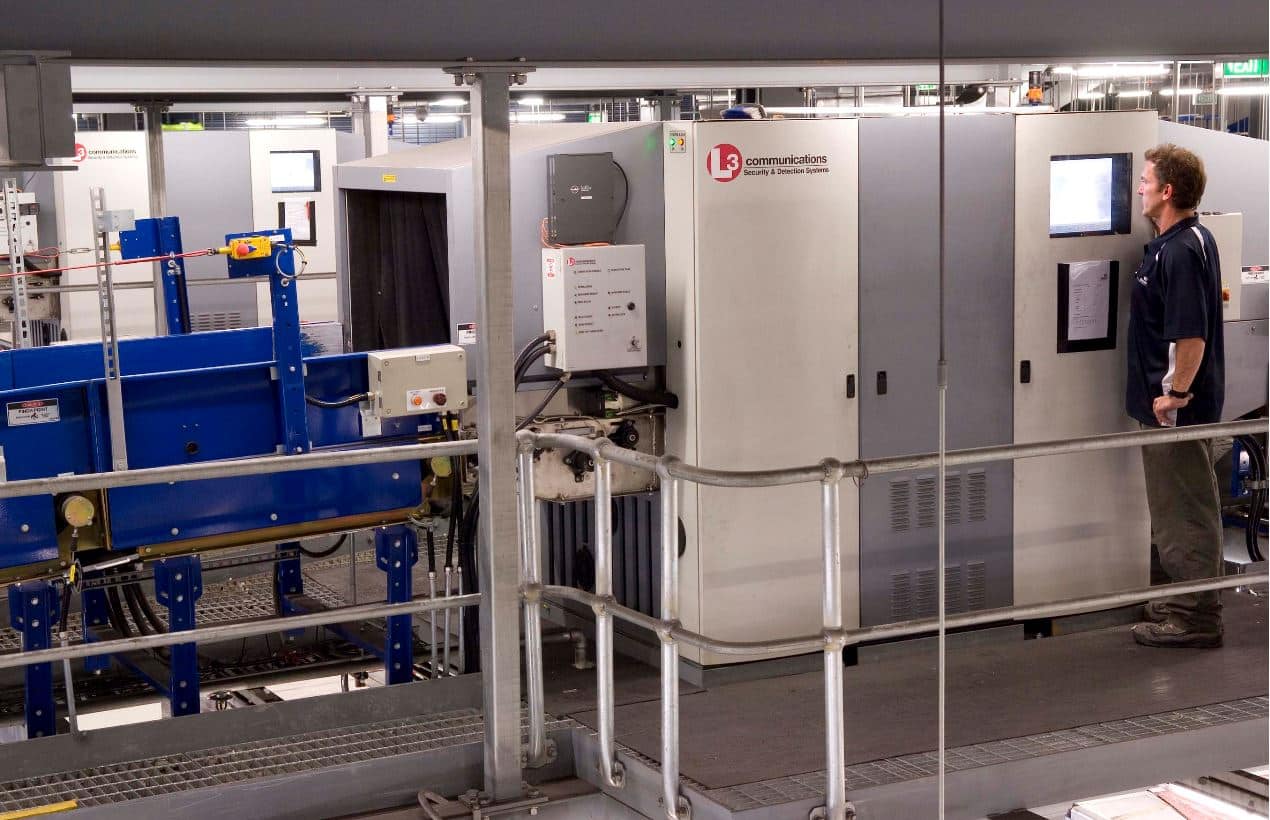 Man looking into screening system