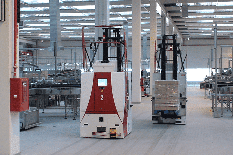 Automated forklifts transporting pallets