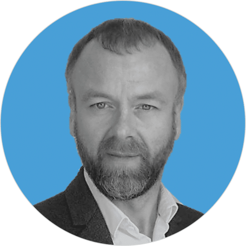 Headshot of Thierry Canevet on blue circle