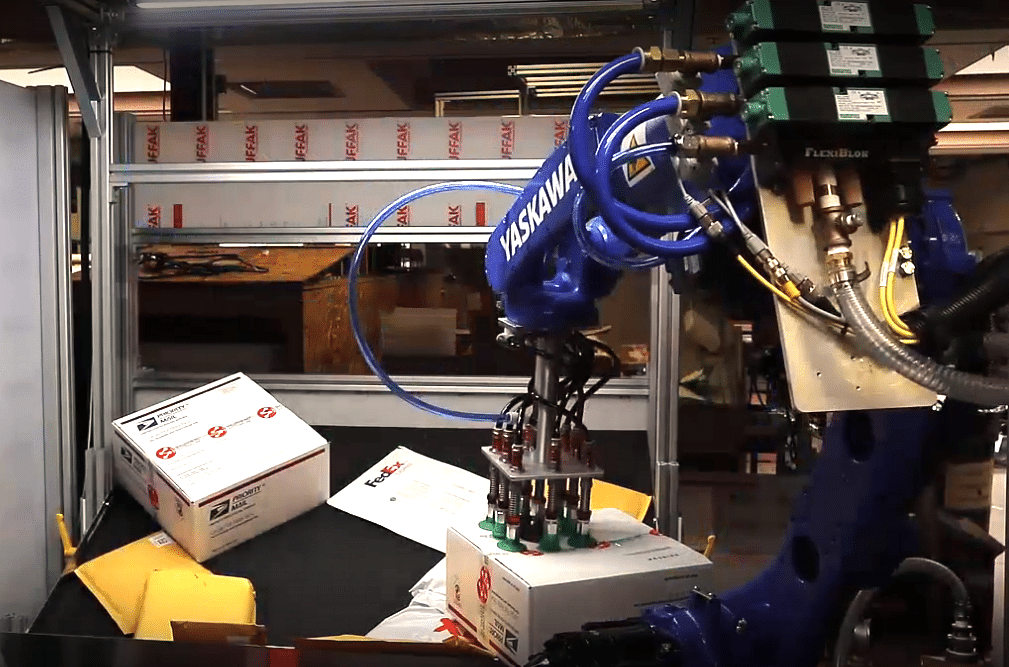 Robotic induction with automated picking