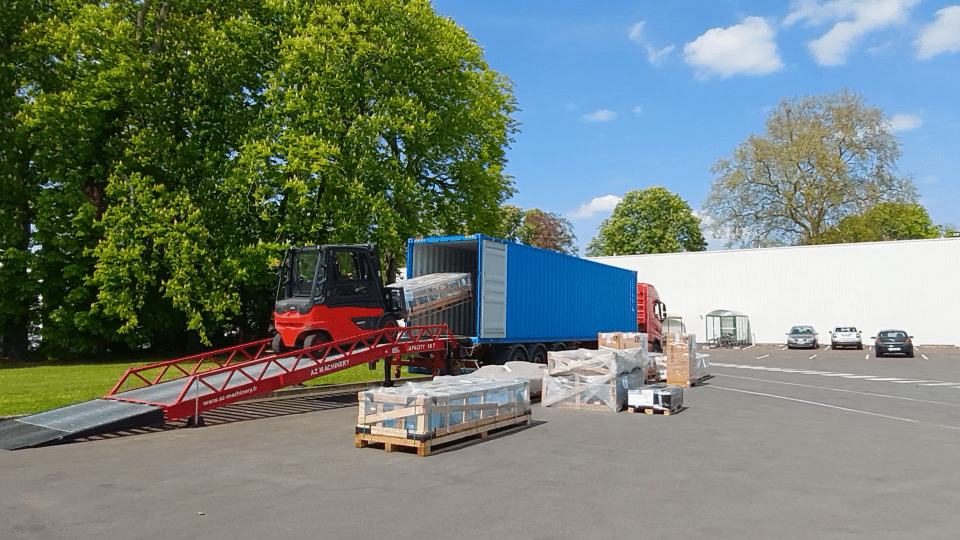 Pallets being loaded onto a truck