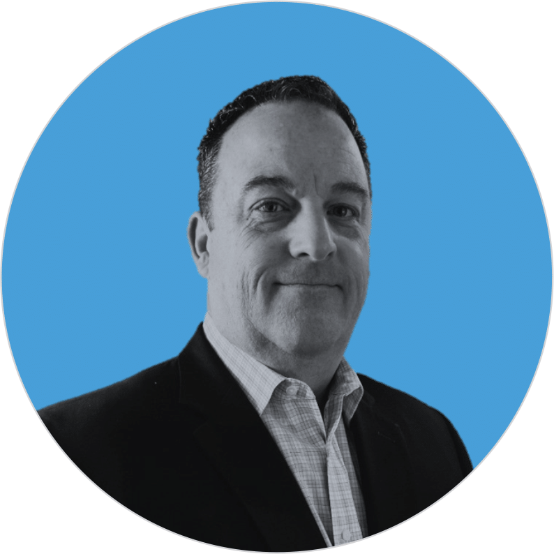 Headshot of Jerry Vaughan on blue circle